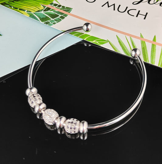 Merry Silver Bangle